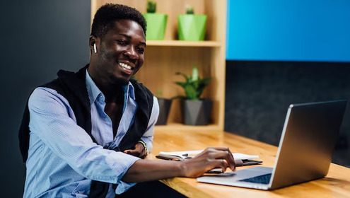 Afro american student working from home using laptop kitchen 496169 2018