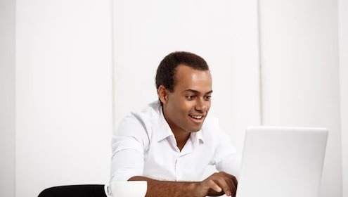 Young successful businessman typing laptop sitting workplace 176420 1231