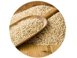 Wooden scoop with sesame seeds 1